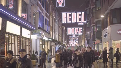 People walking outside the shops during Christmas shopping Stock Footage 87148110