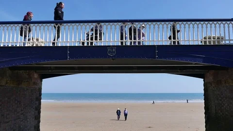 People walking over bridge Stock Footage 75872346