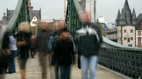 People walking over a bridge. Timelapse. Stock Footage