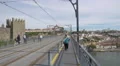 People walking over Dom Luis bridge in Porto 4k or 4k+ Resolution