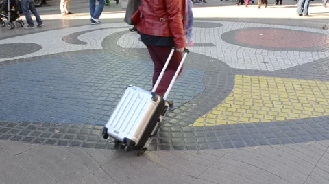 People walking over Joan Miro mosaic in Las Ramblas, Barcelona, Spain Stock Footage 48425366