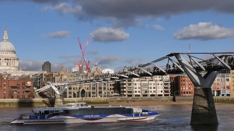 People walking over Millennium bridge, LONDON, Stock Footage 71952049