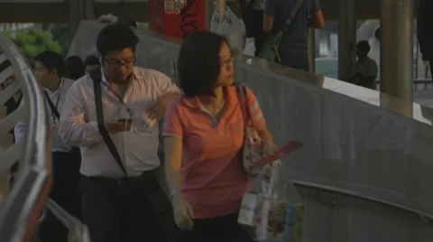 People Walking on overpass &amp; BTS Skytrain at Chong Nonsi BTS Station Stock Footage 48202371