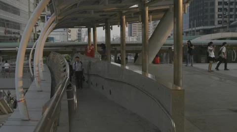 People Walking on overpass &amp; BTS Skytrain at Chong Nonsi BTS Station Stock Footage 48202648