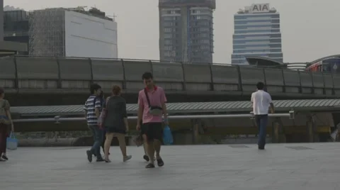 People Walking on overpass &amp; Skytrain at Chong Nonsi BTS Station (Slow Motion) Stock Footage 48619638