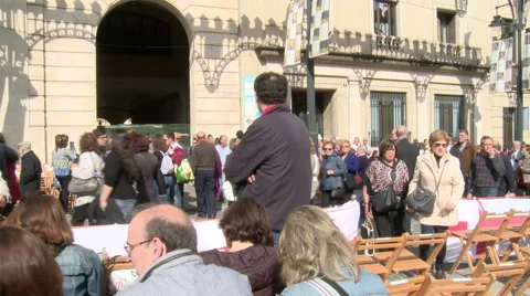 People walking on the parade course before starting, chairs in line Stock Footage 47941729