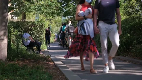 People walking in the park Stock Footage 138900589