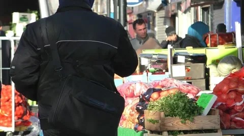 People walking passed crates of fruit &amp; vegetables Stock Footage 45550282