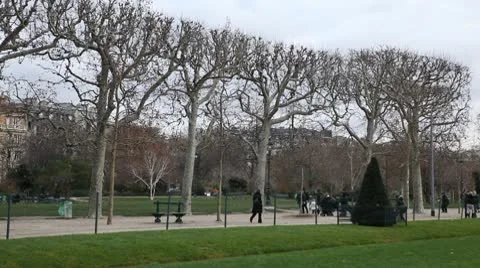 People Walking, Passing, Visiting, Champ de Mars in Paris, France, Tourists Day Stock Footage 10724684