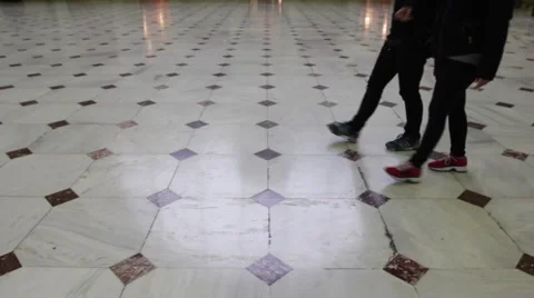 People walking on a patterned floor at Union Station in Washington DC. No faces. Stock Footage 63319781
