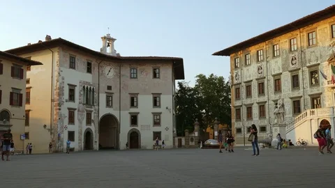 People walking in Piazza dei Cavalieri, a central square in this Tuscan town Stock Footage 77197826