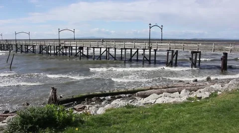 People walking on pier, windy day. Stock Footage 50095464