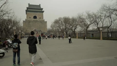 People Walking on Plaza in Front of Drum and Bell Tower, Beijing on Overcast Day Stock Footage 341712664