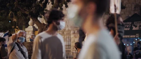 People walking to protest in Jerusalem Stock Footage 152847940