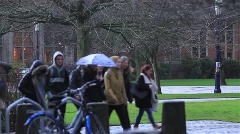 People walking in rain Stock Footage 50064250