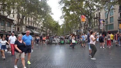 People walking on the rambla during the summer Stock Footage 96317062