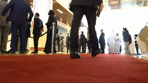 People walking by on a red carpet Stock-Footage 116249532