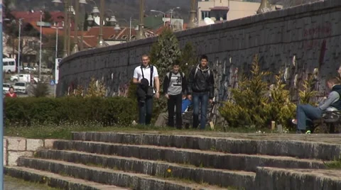 People walking by the river Stockbeeldmateriaal 37429038