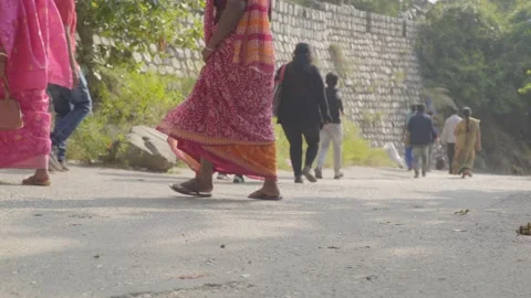 People walking to the road to Mansa Devi Temple in  haridwar Stock Footage 221737545