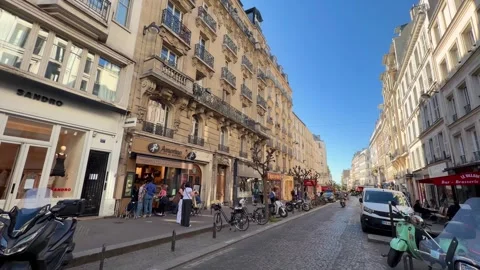 People walking on Rue des Abbesses in Montmartre, Paris Stock Footage 337783607