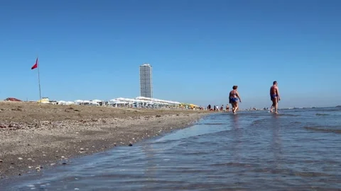 People walking on the seaside in summer Video stock 132048965
