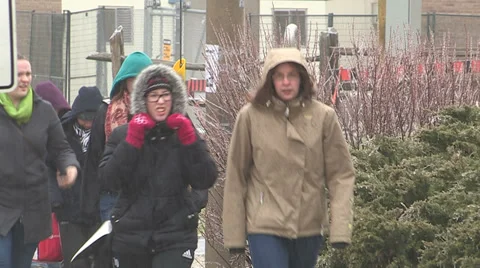 People walking in severe cold weather and snow storm Stock Footage 36756091