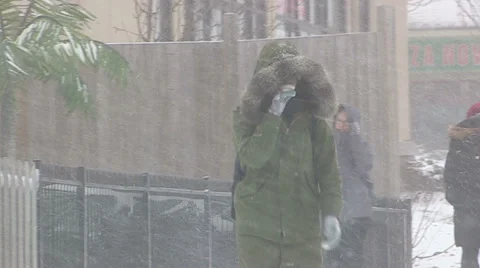 People walking in severe cold weather and snow storm Stock Footage 37190799
