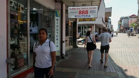 People Walking by Shops in Central Area of Panama City on Hot Sunny Day Stock Footage 313906112