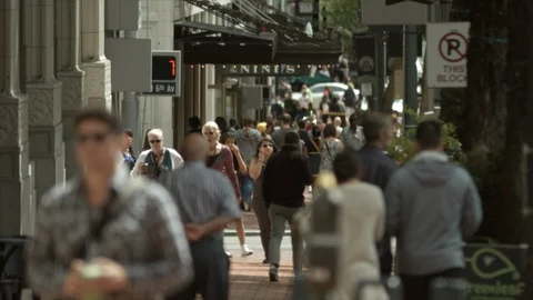 People walking on sidewalk Stock Footage 129589433