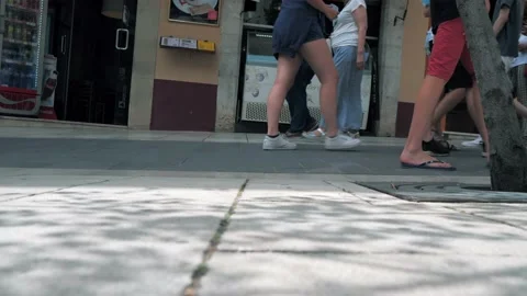 People walking on the sidewalk Stock Footage 169858557
