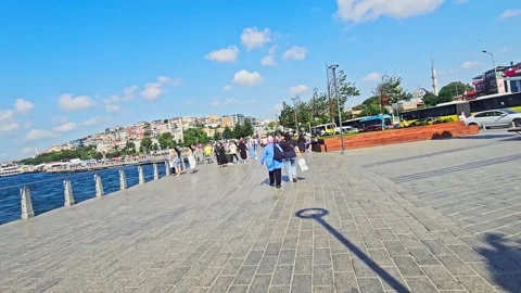 People walking on a sidewalk next to. Stock Footage 282678660