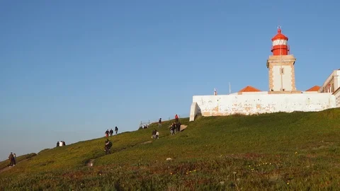 People walking in slow motion at Cape Roca, Portugal. Stock Footage