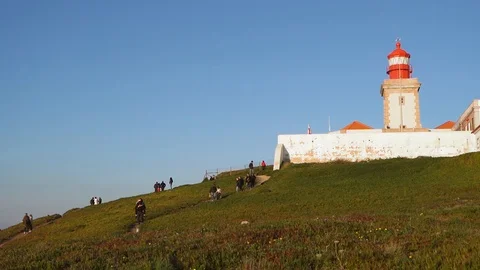People walking in slow motion at Cape Roca, Portugal. Stock Footage 110760985
