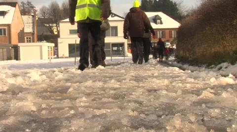 People walking in the snow Stock Footage 59937775