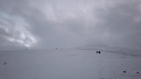 People walking in the snow Stock Footage 111671421
