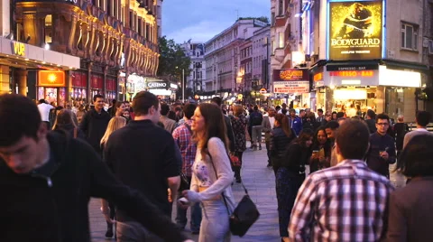 People walking at Soho, London in the evening Stock Footage