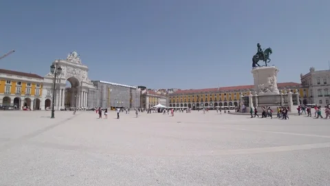 People walking Square do Comercio in downtown Lisbon Stock Footage 90673416