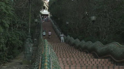 People walking the steps at Wat Phra That Doi Suthep in Chiang Mai, Thailand Stock Footage 48207185
