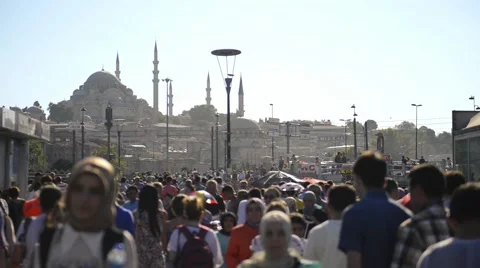 People walking with the Suleymaniye Mosque in background Stock Footage