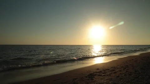 People walking at sunset on the beach 4K Time-lapse Stock Footage 72940918