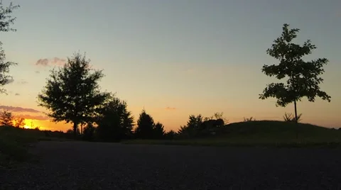 People Walking at Sunset Stock Footage 59339945