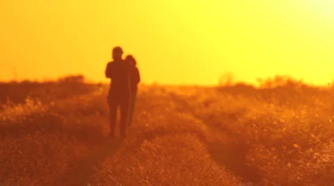 People walking on sunset2 Stock Footage 918175