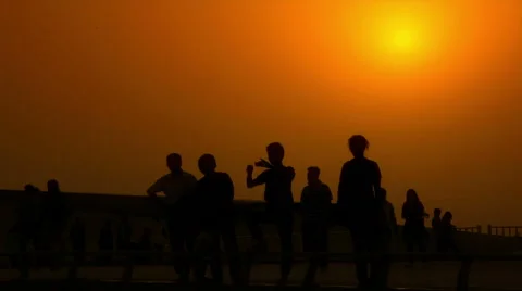 People Walking at sunset_medium Stock Footage 46029836