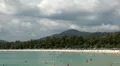 People walking, swimming, snorkeling, Kata Beach in Phuket Island, Thailand HD Footage