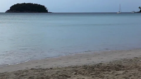 People walking, swimming, snorkeling, Kata Beach in Phuket Island, Thailand Stock Footage