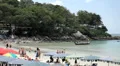 People walking, swimming, snorkeling, Kata Beach in Phuket Island, Thailand HD Footage