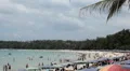 People walking, swimming, snorkeling, Kata Beach in Phuket Island, Thailand HD Footage