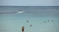 People walking, swimming, snorkeling, Kata Beach in Phuket Island, Thailand HD Footage