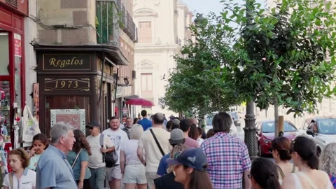 People walking through Calle Mayor of Madrid, Spain, September 6, 2024 Stock Footage 292900935