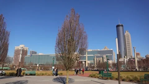 People walking through Centennial Olympic Park in Atlanta Georgia Stock Footage 147618561